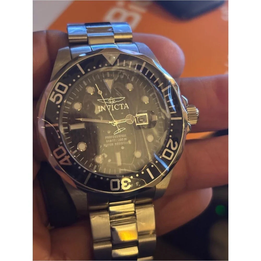 Invicta Silver Watch with Black Dial and Bezel